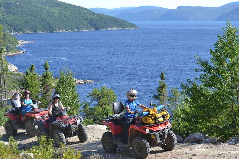 15 min. Tadoussac : Guided ATV tour excursion - Riding from Sacré-Coeur toward the fjord