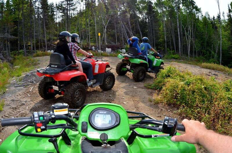 15 min. Tadoussac : Guided ATV tour excursion - Forest trails, hills, and technical ground