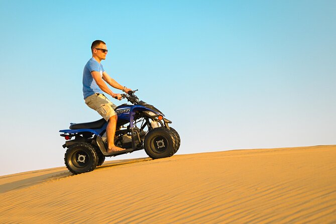 Abu Dhabi Evening Desert Safari - Private car Dune bashing & BBQ - Leaving Abu Dhabi for the open desert