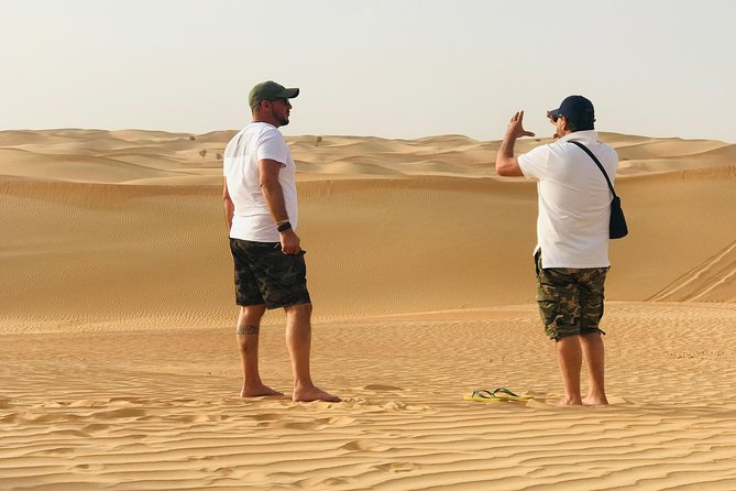 Abu Dhabi Morning Desert Safari,Dune Bashing,Sandboarding,Camel Riding&Quad Bike - Dune bashing across the Abu Dhabi sand
