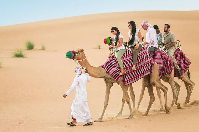 Adventurous Red Dune Desert Safari Deal with Quad Bike,Shows &BBQ - The pickup can shape the whole evening