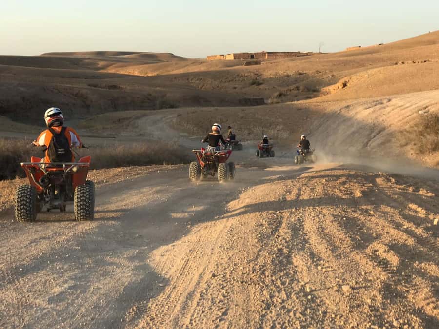 Agafay Desert: Quad, Camel Ride & Luxury Lunch with Pool - Two hours on a quad through Agafay