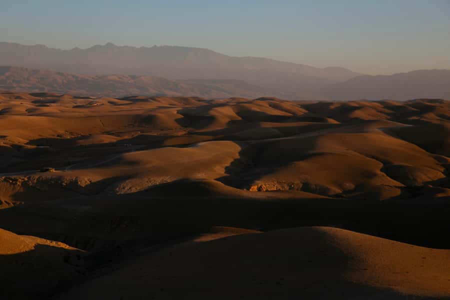 Agafay Tour: Sunset, Dinner, Camel ride, Quad and fire show - Dinner, music, and the fire show