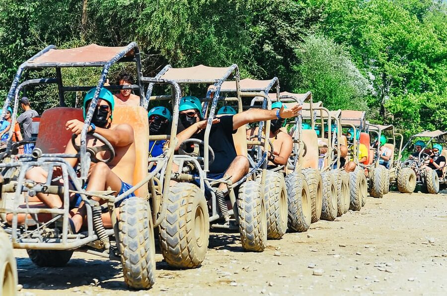 Antalya: Ziplining, Rafting, Jeep Tour & Quad Safari w/Lunch - Ziplining at the end of an active day