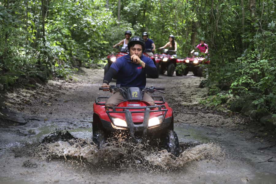 ATV Adventure to Jade Cavern Double - Riding through Cozumel’s jungle