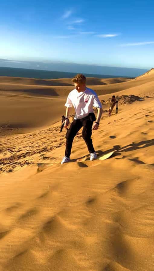 Best Agadir Desert Adventure: Quad Camel Sandboarding & BBQ - Sandboarding for beginners at Timlalin