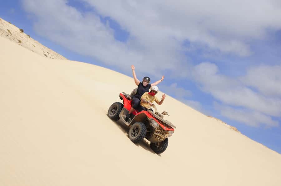 Boa Vista: Off-Road Quad Bike to Santa Monica & Caves - Riding the dunes at Morro de Areia