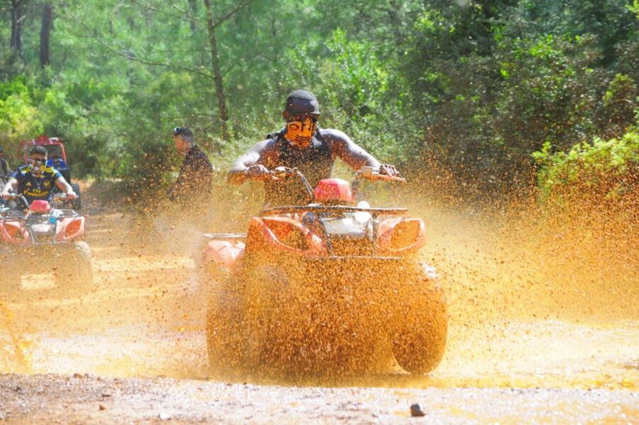 Bodrum: Off-Road Quad Safari with Hotel Pickup - Riding through dust, rocks, and mud