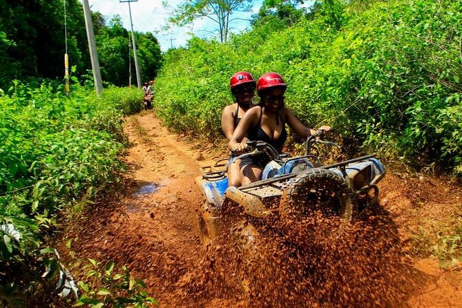 Cancun Best ATV Tour, Ziplines and Cenote Swim with Lunch - ATV riding on a bumpy jungle course