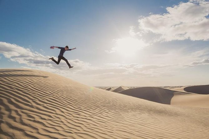 Desert safari, Dune bashing, sandboarding, camel, ATV Option - Optional quad biking adds speed and noise