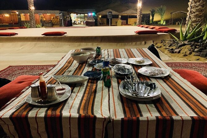 Desert Safari Experience with Dune Bashing and Dinner in Dubai - A camel farm and a closer look at falconry