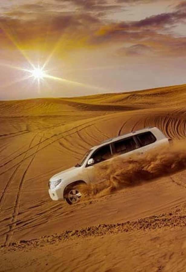 Desert Safari, Quad Bike, Camel Ride, Falcon & Sandboarding - Tire deflation and the start of dune bashing