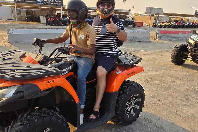 Desert Safari, Quad Bike, Sandboarding and Camel Ride - Sandboarding adds a low-tech thrill