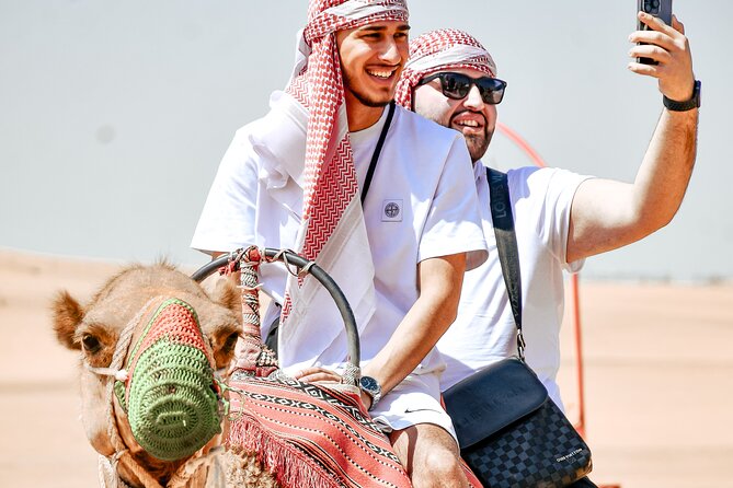 Desert Safari With BBQ Dinner, Quad Bike & Camel Ride from Dubai - Sunset photos, sandboarding, and the quad-bike session