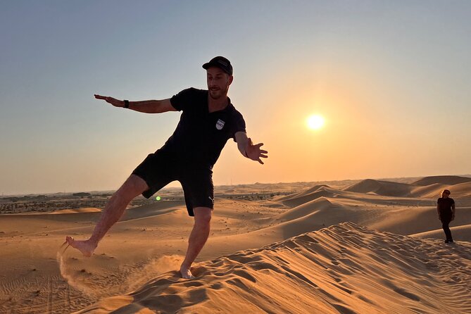 Desert Safari with Dune Bashing and Camel Ride plus Sand Boarding - Henna, falcons, and traditional dress