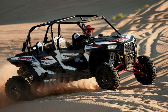 Desert Safari with Dune Bashing and Dinner In Dubai - Sunset photographs across the sand