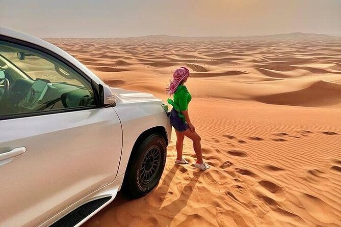 Desert Safari with Quad Bike Camel ride ,SandBoarding ,InalndSea - Camel riding, tea, and your first photos
