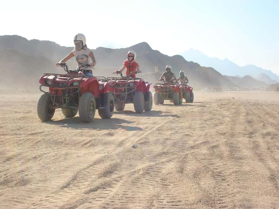 Desert Sunset Quad Bike ATV for 50Km, Oriental Show, Dinner, - A Bedouin camp with tea, camels, and a simple meal