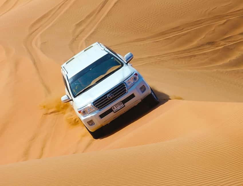 Doha: ATV, Quad or Buggy, Dune Bashing, Camel & Sandboarding - Dune bashing in a Land Cruiser