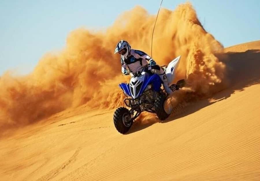Doha:ATV,Quad or Buggy Dune Bashing,CamelRide & Sandboarding - Reaching the Inland Sea of Khor al Adaid