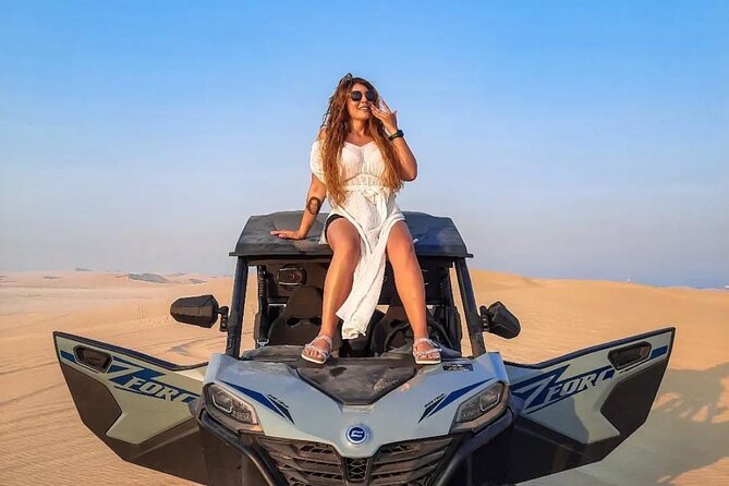 Doha Desert Safari Camel Ride Dune Bashing and ATV Bike - Sandboarding makes use of the dunes