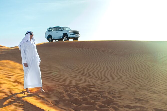 Doha Desert Safari Dune Bashing Camel Ride Sandboarding - Sandboarding and photo stops at Inland Sea Beach