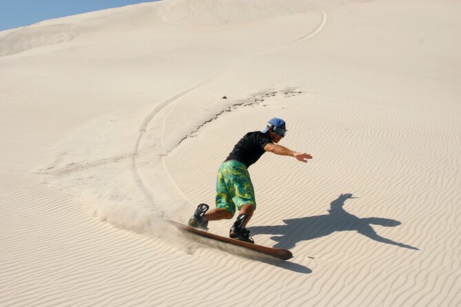 Doha Desert Safari Dune bashing,Sandboarding,CamelRide,Inland Sea - Camel rides, falcons, and the extra-cost question