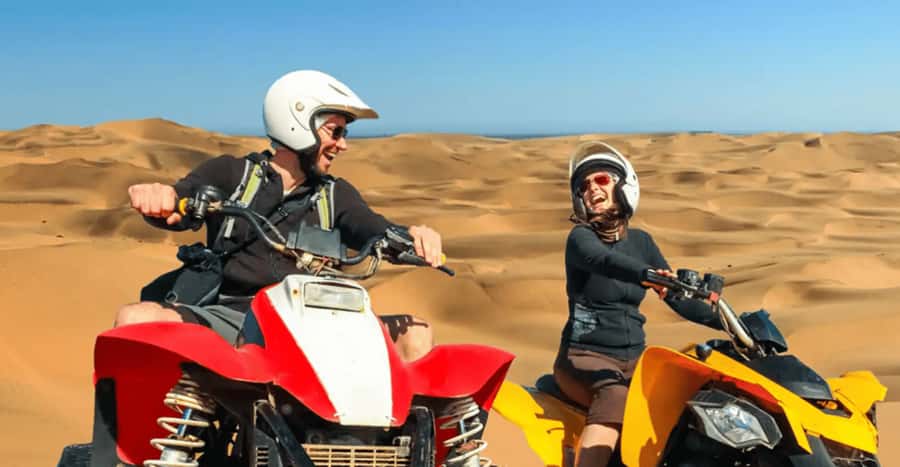 Doha: DesertSafari with Quad Bike, Camel Ride & Sandboarding - Sandboarding on the soft dunes