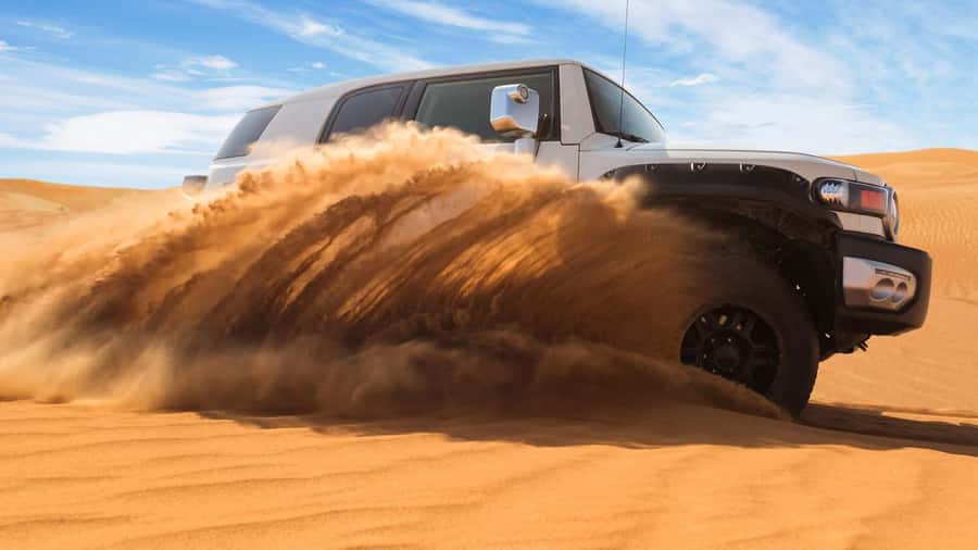 Doha: DesertSafari with Quad Bike, Camel Ride & Sandboarding - Khor Al Adaid, where sand meets the sea