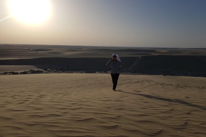 Doha :Half Day Desert Safari | Camel Riding | ATV | Sand Surfing - Sandboarding on open dunes