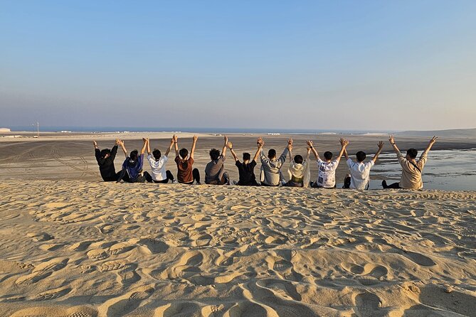 Doha Qatar ATV Quad Bike Buggy Dune Bashing and Camel Ride - Camel stop, falcon photographs, and Bedouin tea