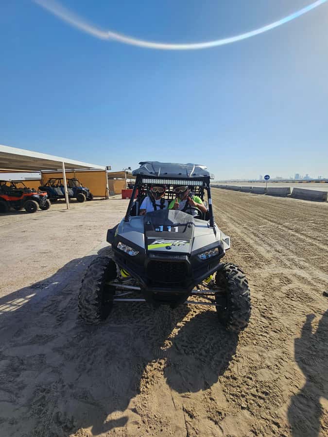 Doha: Quad Bike, Desert Safari, Buggy ride & inland sea tour - A short camel ride and falcon photo stop