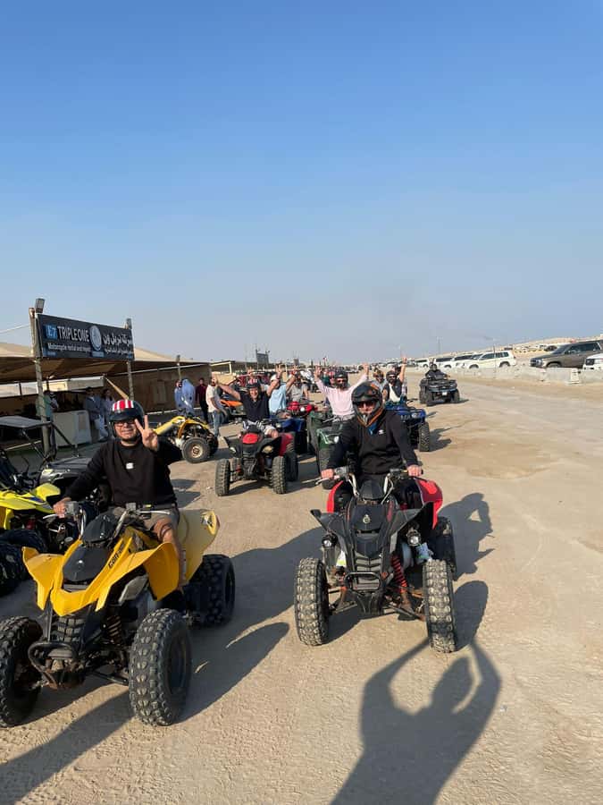 Doha: Quad Bike, Desert Safari, Buggy ride & inland sea tour - Sandboarding for ten minutes of fun