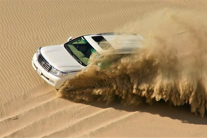 Doha: Quad Bike, Dune Bashing, Camel Ride & Inland Sea Tour - From Doha streets to open sand