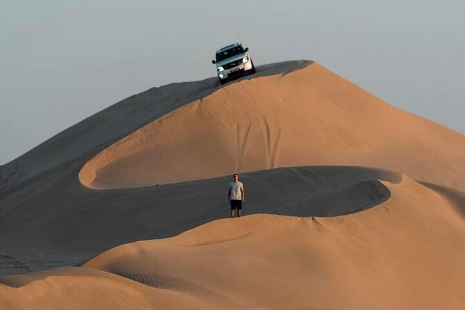 Doha: Quad Bike, Dune Bashing, Camel Ride & Inland Sea Tour - Quad biking on approved tracks