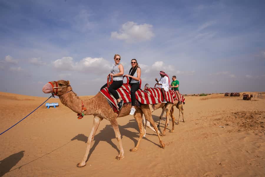Dubai: Adventure Quad Bike Safari, Camel Ride & Refreshment - Leaving Dubai for the desert