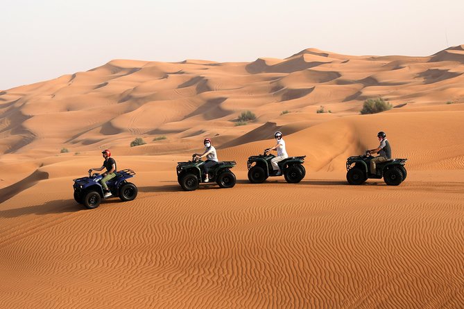 Dubai: Adventure Quad Bike Safari, Camel Ride & Refreshments - Leaving Dubai for the red dunes of Lahbab