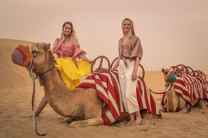 Dubai: Adventure Quad Bike Safari, Camel Ride & Refreshments - Sandboarding adds a short, tiring thrill