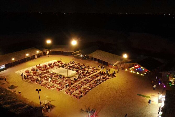 Dubai: Buggy Dune Bashing, Sand Boarding, Camel Ride & Show - Sandboarding adds a second kind of fun