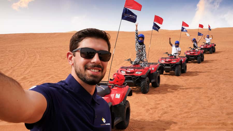 Dubai Desert Adventure: Red Dunes Guided Quad/Polaris & BBQ - Red dunes, sandboarding, and the best photo stop