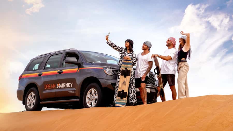Dubai Desert Safari - Camel Ride, Sandboarding & 30 Min Quad - Hotel pickup and the 50-minute drive