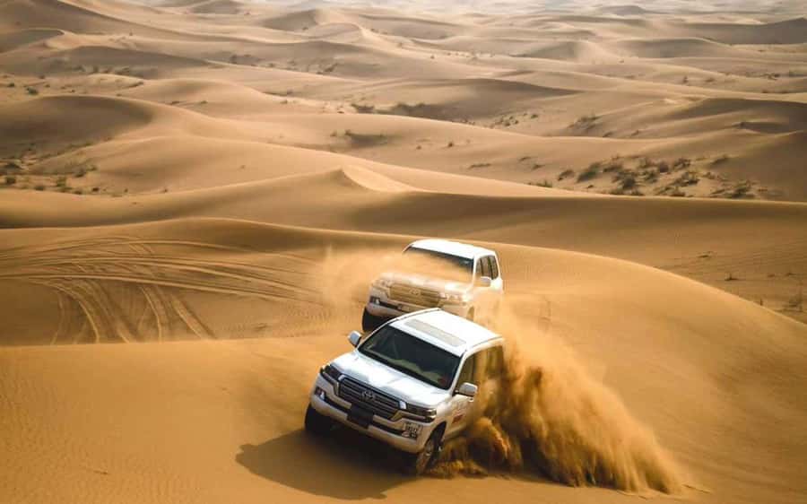 Dubai: Desert Safari, Camel Ride, Sandboarding, Quad Bike - The two-hour camp evening