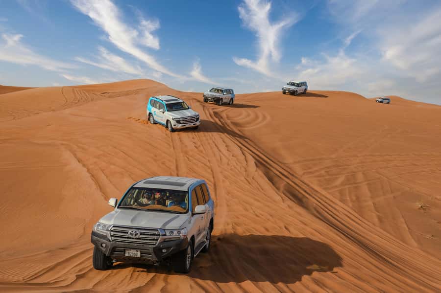 Dubai: Desert Safari, Quad Bike, Camel Ride & Al Khayma Camp - Guides make a real difference