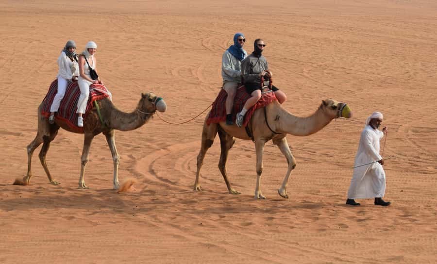 Dubai: Desert Safari, Quad Bike, Camel Ride and Sandboarding - From Dubai streets to Lahbab’s red dunes