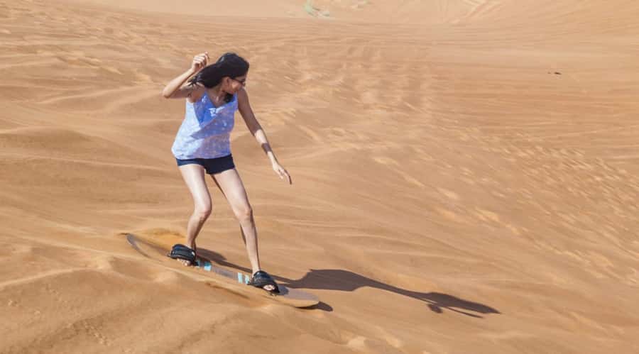 Dubai: Desert Safari, Quad Bike, Camel Ride and Sandboarding - Optional quad biking on open sand