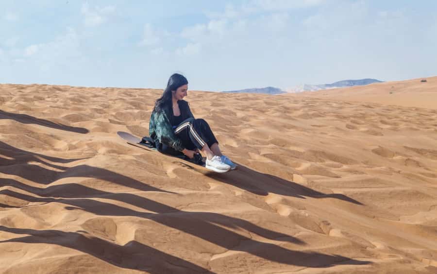 Dubai: Desert Safari, Quad Bike, Camel Ride and Sandboarding - Sunset timing and the four-hour schedule