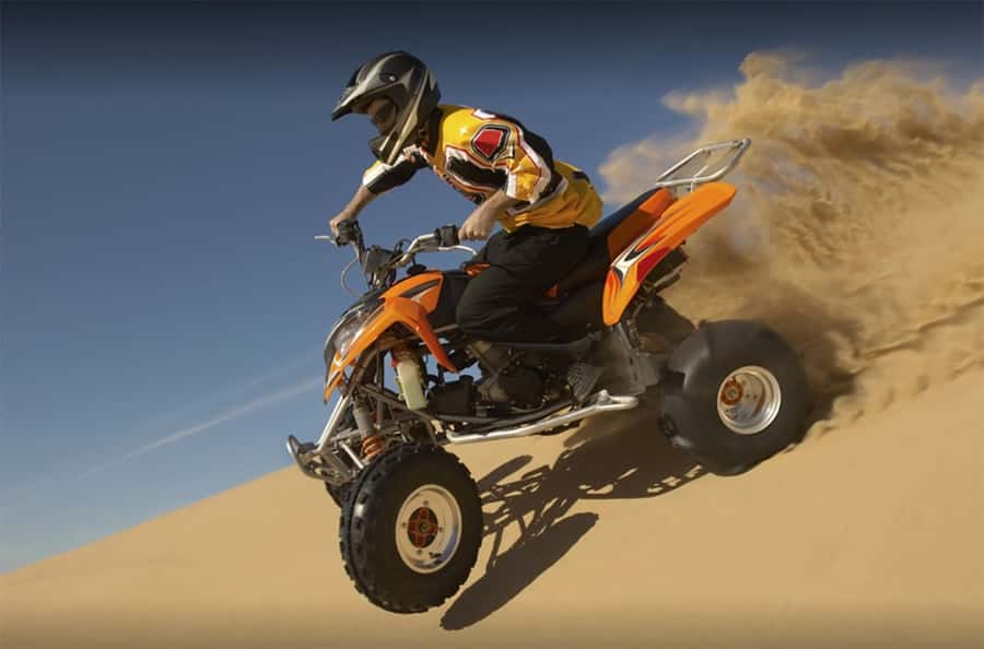 Dubai: Desert Safari, Quad Bike, Camel Ride and Sandboarding - A short camel ride before the high-speed fun