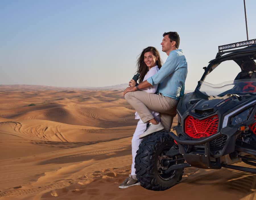 Dubai: Desert Safari, Quad Bike & Premium Camp Experience - Sandboarding and optional motorized fun