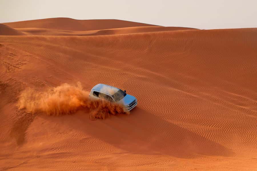 Dubai: Desert Safari, Quad Bike, Sandboarding, Camels & BBQ - What the $44 price really covers