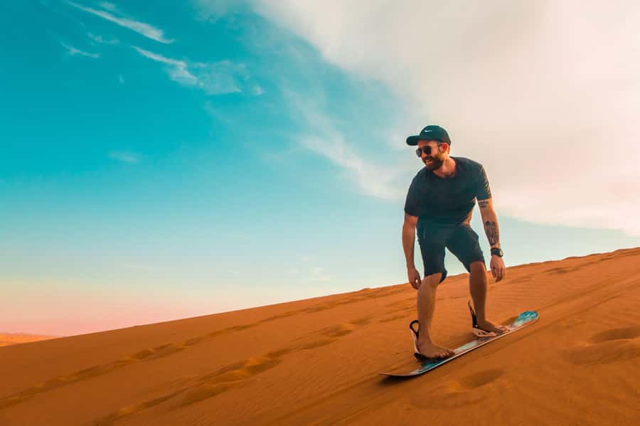 Dubai: Desert Safari, Quad Bike, Sandboarding, Camels & BBQ - Dune bashing across Lehbab’s red sand